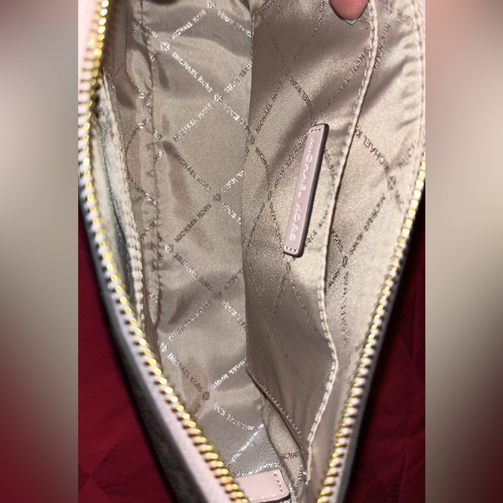 Small brown and pink MK purse